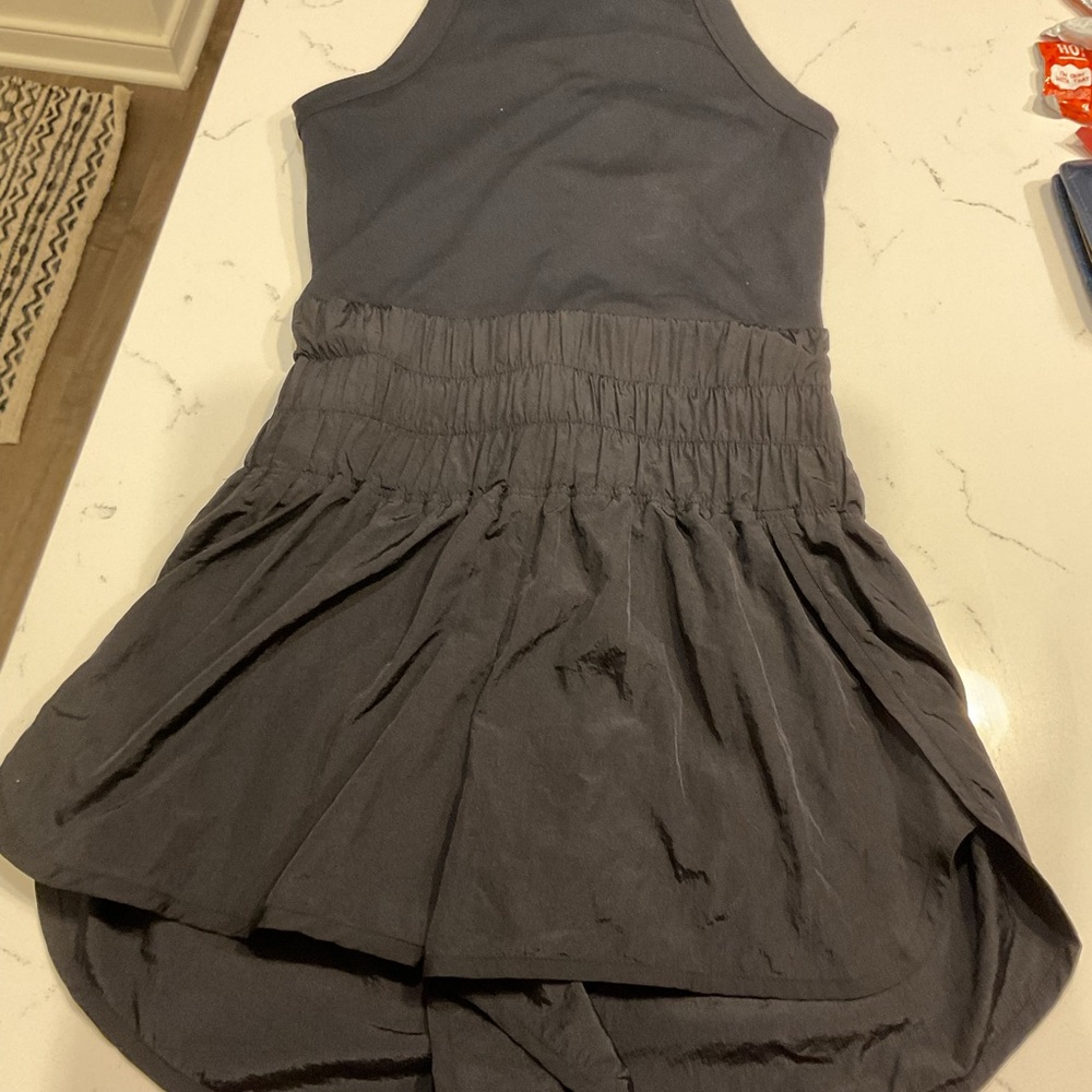 Free people movement runsie one piece 
In used good condition black